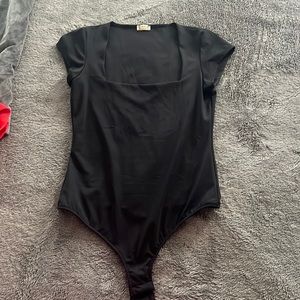 Black, square neck body suit - never worn only tried on. Free People, size M